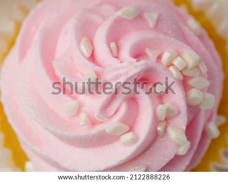 Macro shot. Pink whipped cream topped with white marshmallows. Dessert, sweet food, decoration for cakes, pastries, cupcakes. Holiday, birthday, date. Advertising, banner. food design.