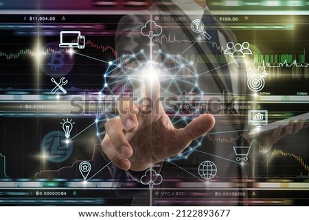 Businessman hand touching the Polygonal brain shape of an artificial intelligence with various icon of smart city Internet of Things Technology over Cryptocurrency Bitcoin exchange trading, AI concept Royalty-Free Stock Photo #2122893677