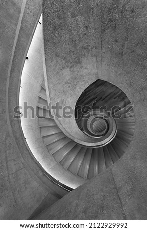 Modern spiral staircase. Contemporary architecture abstract background Royalty-Free Stock Photo #2122929992