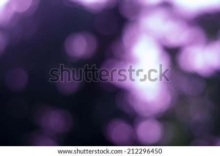 Purple bokeh light of blur nature image background