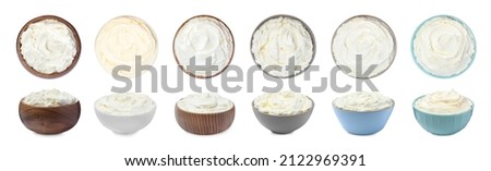 Tasty fresh cream cheese on white background. Banner design Royalty-Free Stock Photo #2122969391