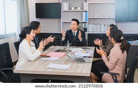 manager and workers happy on business success in business corporate team meeting, leadership businessman work professional businesswoman on business team discussion in corporate meeting