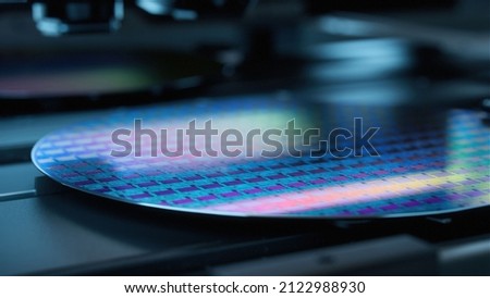 Silicon Wafer During Production at Advanced Semiconductor Foundry, that produces Microchips Royalty-Free Stock Photo #2122988930