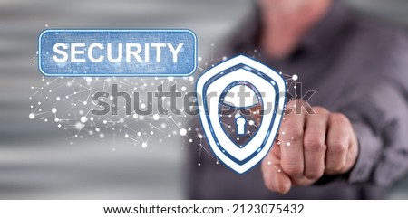 Man touching a cyber security concept on a touch screen with his finger