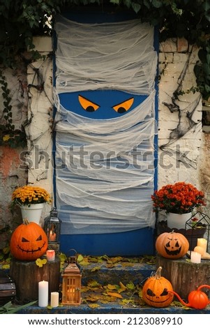 Yard entrance decorated for traditional Halloween celebration