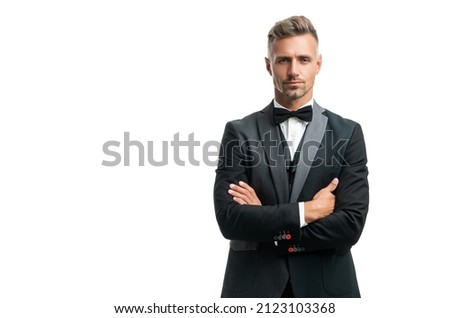 mature man in bow tie suit crossed hands. businessman isolated on white. gentleman in formal wear. Royalty-Free Stock Photo #2123103368