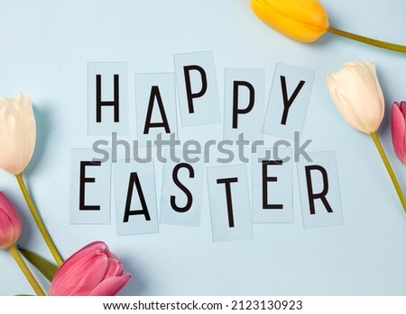 Happy Easter concept on blue