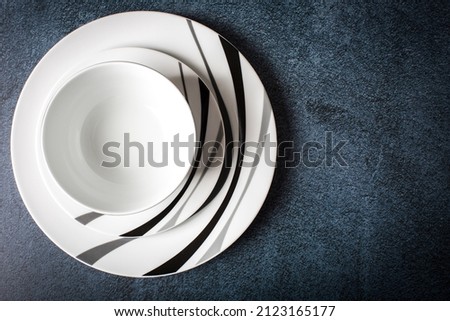 top view of beautiful bowl and plates with copy space