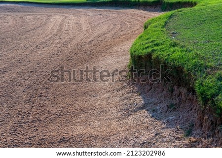 Beautiful background photo of golf course sandpit.