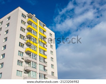Gray yellow pantone new building house many floors and blue sky background