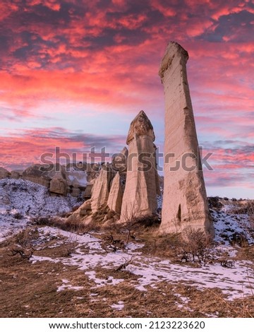 Fairy chimneys view in Cappadocia Royalty-Free Stock Photo #2123223620