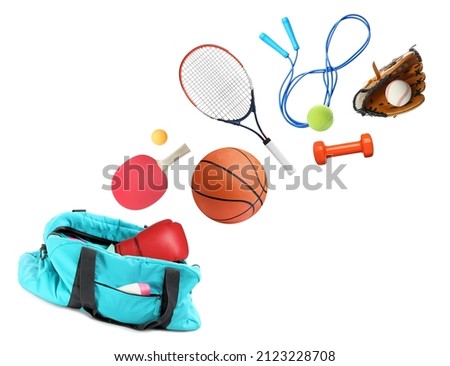 Sports bag and different gym stuff flying on white background Royalty-Free Stock Photo #2123228708
