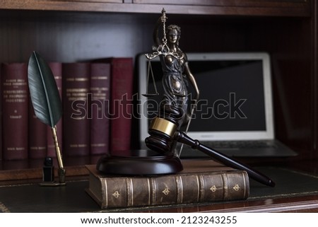 Concept showing of Problems with legal system, delay or slow in judicial justice system by using judge hammer, and clock.