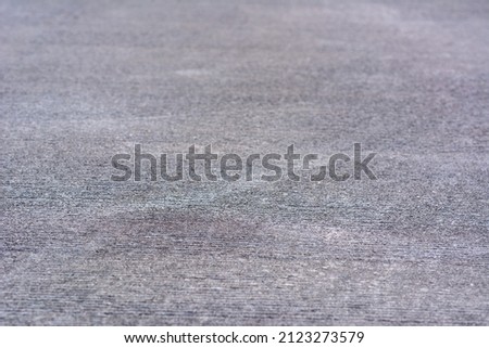 Concrete road surface on natural light background.