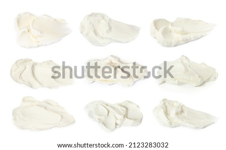 Tasty fresh cream cheese on white background Royalty-Free Stock Photo #2123283032