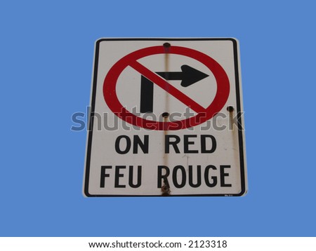 bilingual no turning right on red light in french and english