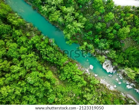 Aerial view of natural swimming pool in Bagno Vignoni, with thermal spring water and waterfall. Geothermal pools and hot springs in Tuscany, Italy. Royalty-Free Stock Photo #2123319050