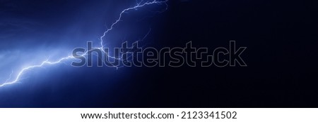 Lightning, thunder cloud dark cloudy sky background Royalty-Free Stock Photo #2123341502