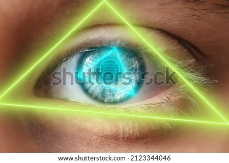 Eye with computer numbers, in a triangle