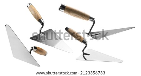 Trowel in different angles on a white background Royalty-Free Stock Photo #2123356733