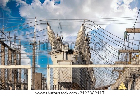 High voltage circuit breaker in a substation. Power generation. Energy source Royalty-Free Stock Photo #2123369117