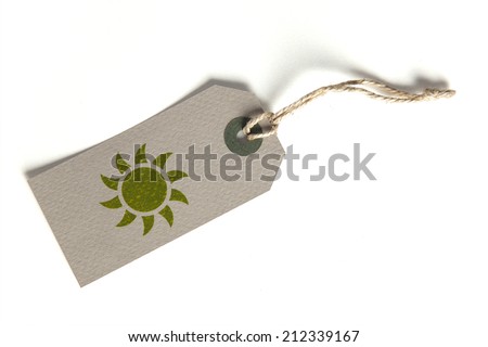 Tag with environmentally-themed, sun symbol on it