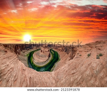 Panoramic aerial view of Horseshoe Bend and Colorado River at summer sunset Royalty-Free Stock Photo #2123391878