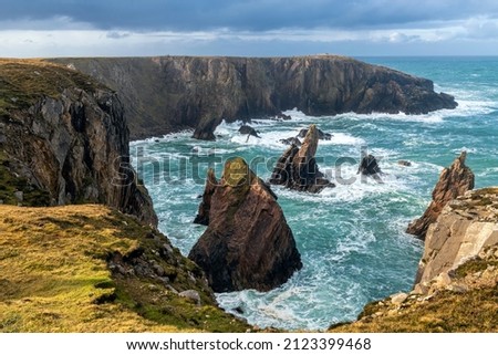 Mangersta Sea Stacks during cloudy day, Isle of Lewis, Outer Hebrides, Scotland. Royalty-Free Stock Photo #2123399468