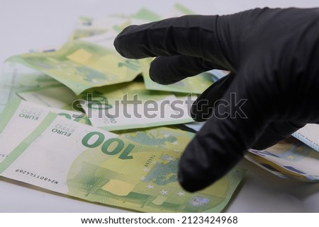 theft and stealing of money, taking away money and economic crime Royalty-Free Stock Photo #2123424968