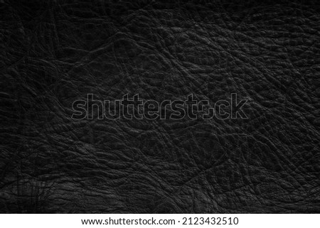 Closeup of seamless black leather texture background, surface material for fashion dark pattern luxury wallet components with fabric exclusive, sofa and wallpaper design interior decoration.
