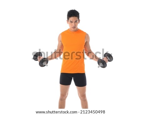 Man in a orange shirt holding dumbbells, sport training concept