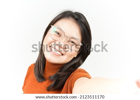 Smile and Take A selfie Of Beautiful Asian Woman Isolated On White Background