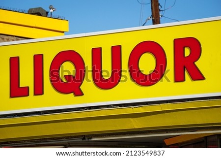 Worn retro liquor store sign