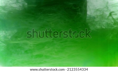 Abstract blur of beautiful green on a blue background