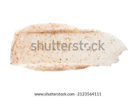Stroke of homemade body scrub smear with orange grains Royalty-Free Stock Photo #2123564111