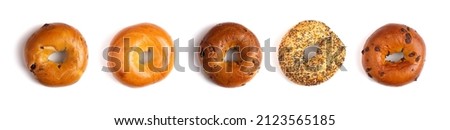 Five Different Types of Bagels on a White Background Royalty-Free Stock Photo #2123565185