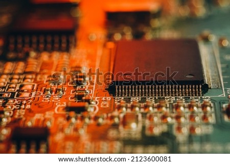 Shortage of chips in car manufacturing. High-tech production of electronic chips and electronic control boards. Royalty-Free Stock Photo #2123600081