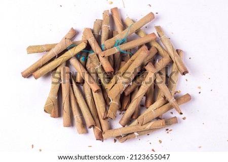 Bidi, you can say it as desi or Indian cigarette, made of dry leaves. smoking is injurious to health