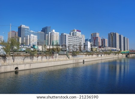 Modern city beside the river