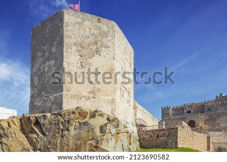 Tower of the castle of Guzman the Good guarding the Strait of Gibraltar in Tarifa Royalty-Free Stock Photo #2123690582