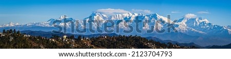 Panoramic view of Himalayan Mountain Ranges at Kasardevi, Nanital, Uttarakhand, Kumani Range. Himalaya Panoramic photography  Royalty-Free Stock Photo #2123704793