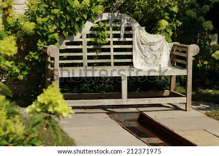 wooden garden bench in the park, Moscow, Russia