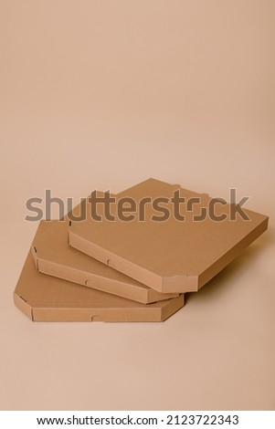 Cardboard boxes for pizza on the background Ecological concept