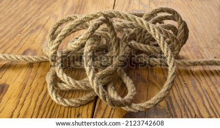 Brown nautical strong rope on the table close-up 