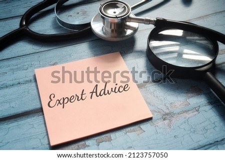 Expert Advice wording with stethoscope and magnifying glass