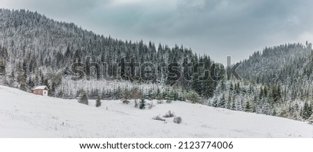 Wintry snowy landscape in the Rhodope Mountains in Bulgaria Royalty-Free Stock Photo #2123774006