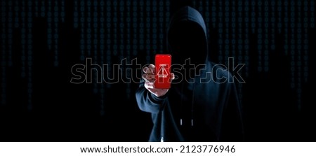 Cyber security hacker smartphone. Internet web hack technology. Digital mobile phone in hacker man hand isolated on black banner. Data protection, secured internet access, cybersecurity Royalty-Free Stock Photo #2123776946