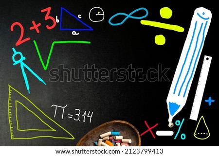 Funny math and geometry school background. Simple freehand drawings on a vintage blackboard and chalk with space for text