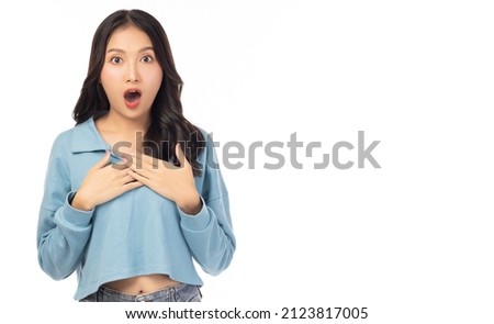Surprised happy beauty asian woman looking camera in excitement with mouth open Expressive facial expressions. Beautiful girl act like a satisfied product Isolated on white background copy space Royalty-Free Stock Photo #2123817005