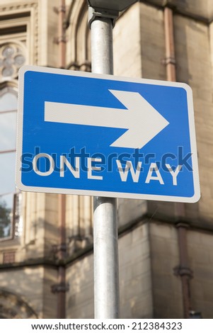 One Way Sign in Urban Setting